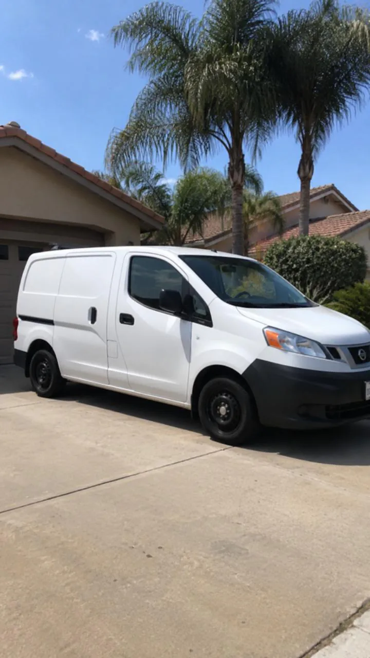 Escondido Appliance Repair service van parked in a driveway
